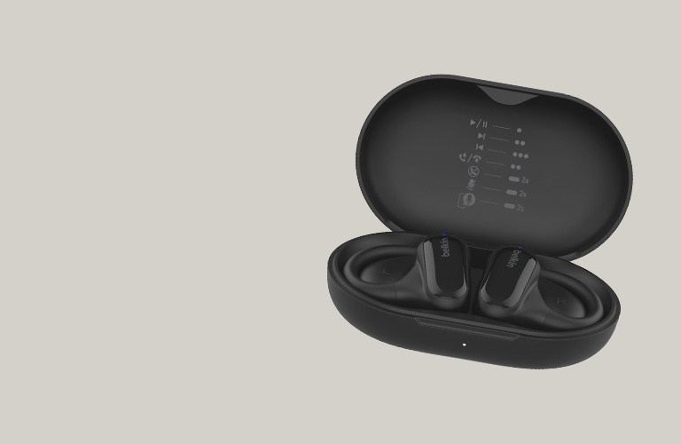 SoundForm Isolate Noise Cancelling Over-Ear Headphones shown in sand color, featuring a sleek, cushioned design with over-ear padding against a neutral background.